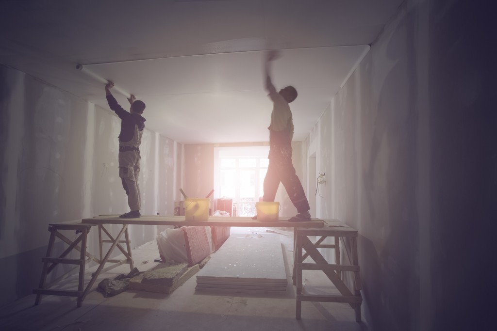 men renovating a home