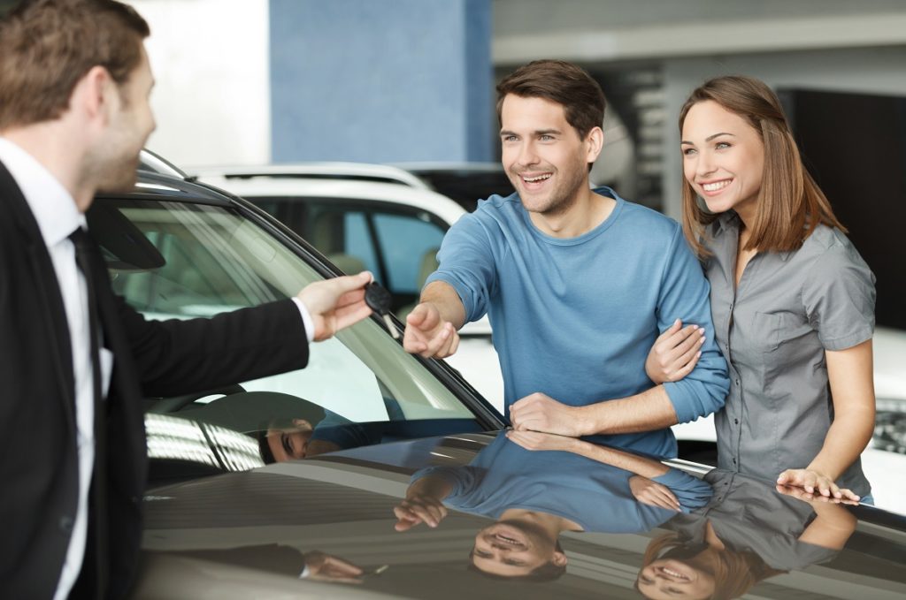 Couple buying a car