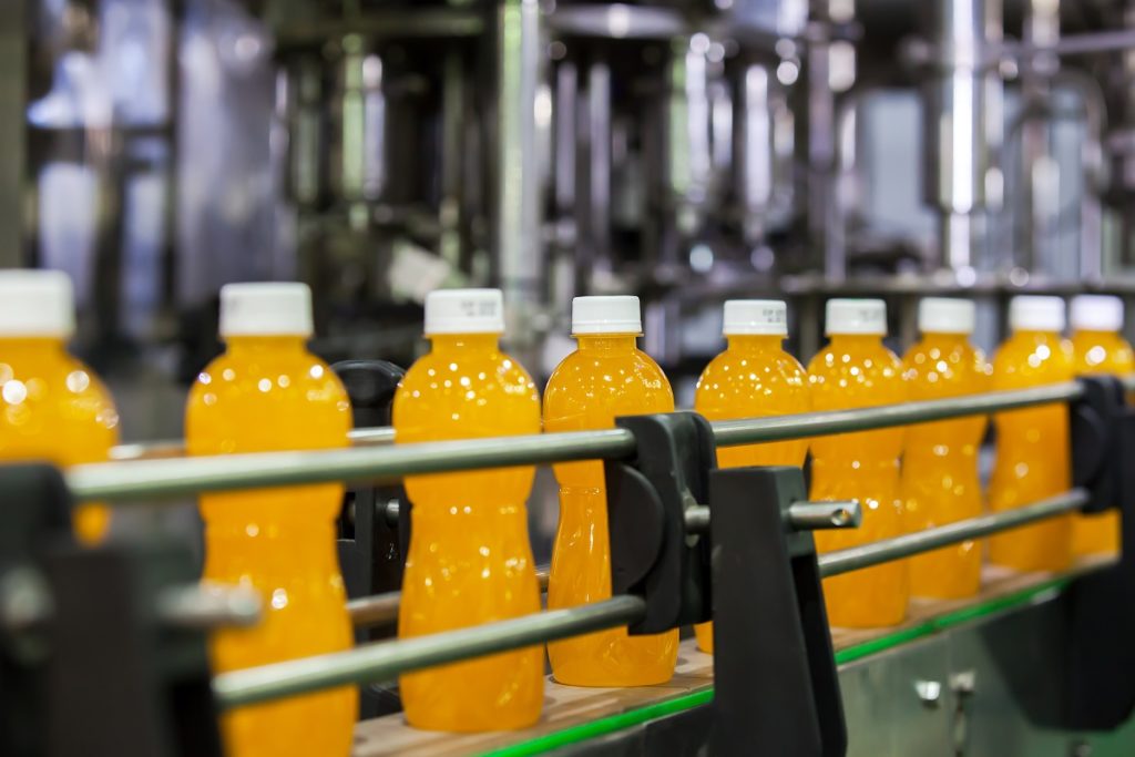 soda bottles on the conveyor belt