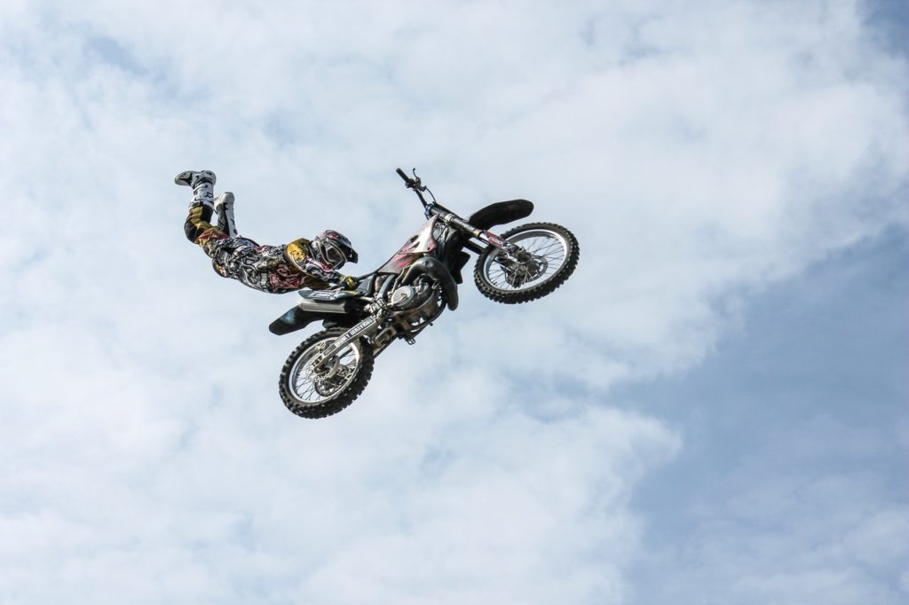 man in the air with his motorbike
